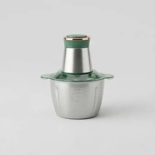 hachoir électrique en inox présenté dans un fond sobre et uniforme