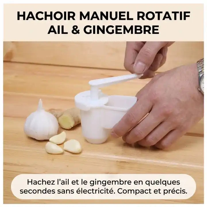 Hachoir manuel rotatif compact en plastique blanc pour hacher l'ail et le gingembre frais en cuisine, sans électricité.