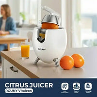 Hachoir extracteur de jus ROUNY 850W en acier inoxydable pour agrumes en action - Préparation culinaire rapide