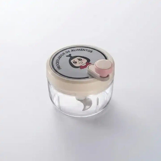 Hachoir manuel rotatif rose 200ml multifonction pour ail en situation d'utilisation