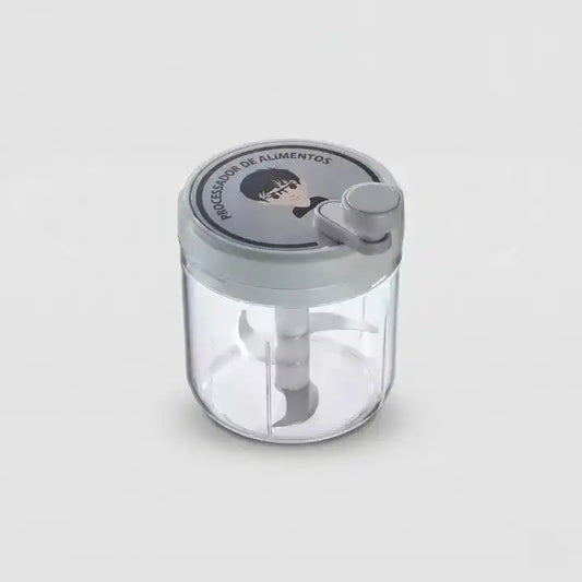 Hachoir manuel rotatif vert 400ml multifonction pour ail en situation d'utilisation