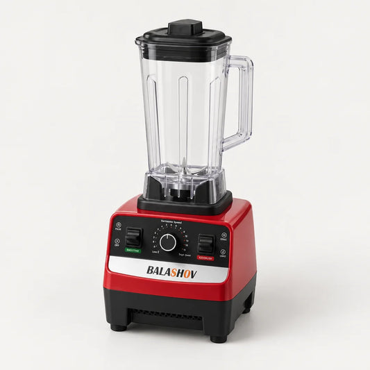 Blender professionnel BALASHOV 2000W rouge et noir à grand bol transparent de 2 L, vu en plongée sur fond blanc cassé