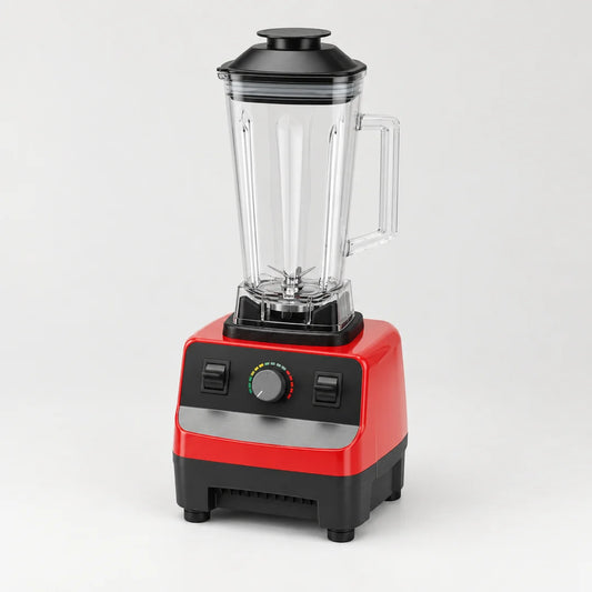 Blender professionnel 2000W rouge et noir à grand bol transparent de 2 L et couvercle noir, sur fond blanc cassé