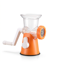 Hachoir à viande manuel à ventouse, orange, vue produit sur fond blanc