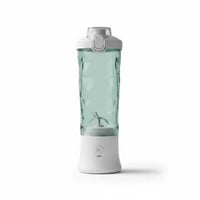 Mixeur portable rechargeable avec cuve transparente à facettes diamant et base blanche, sur fond blanc